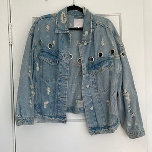 Denim jean jacket with rips and holes